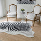 Acadia Animal Print Synthetic Blend Indoor Area Rug by Momeni Rugs